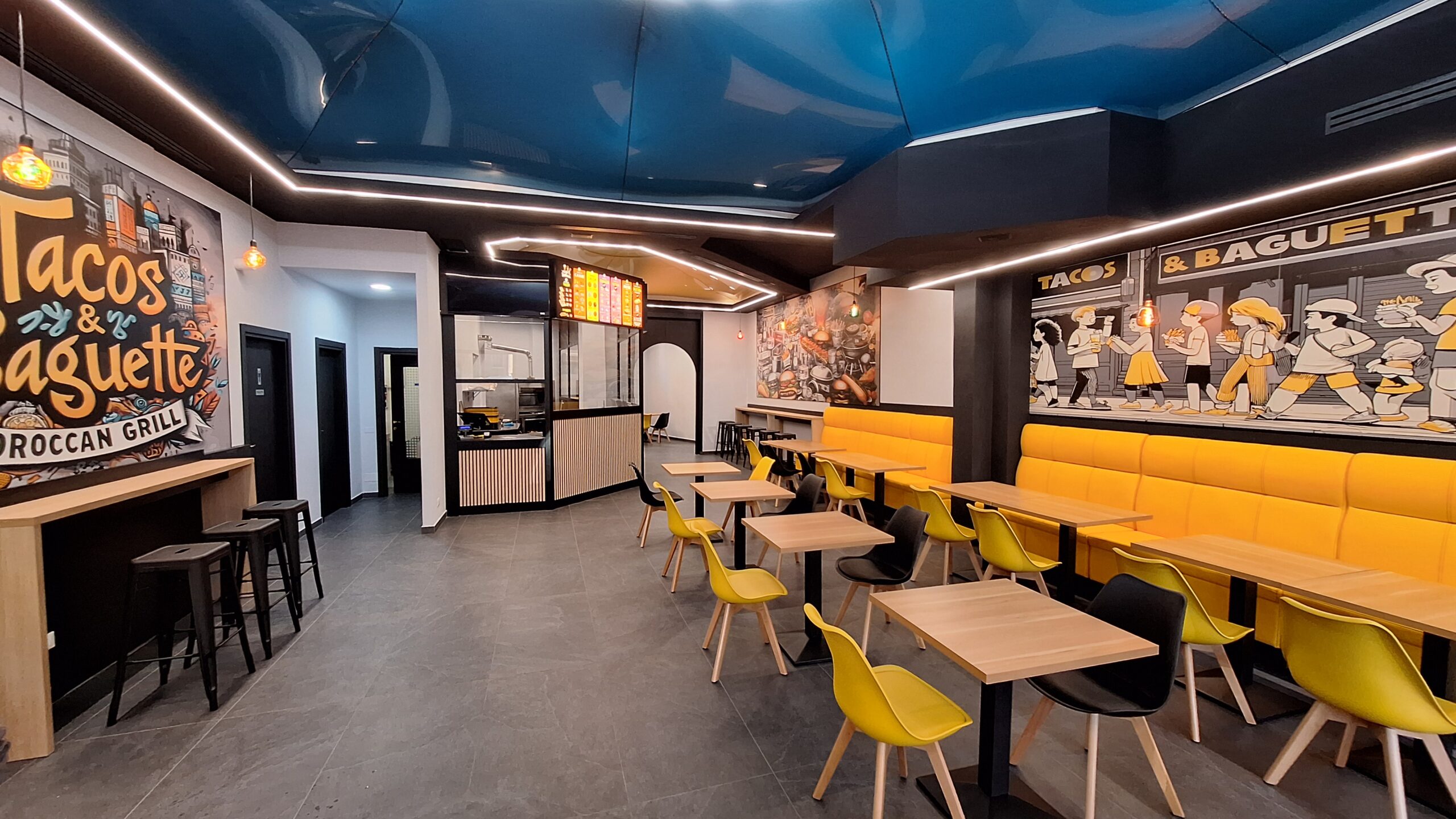 Soluzioni su misura: layout operativo, arredi resistenti e attrezzature professionali creano un fast food moderno, veloce e dall'identità dinamica.
